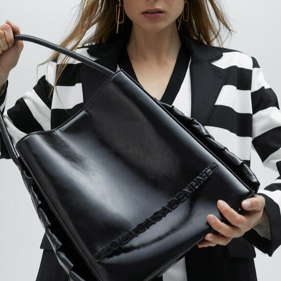BOLSO SHOPPER CON DETALLES LATERALES